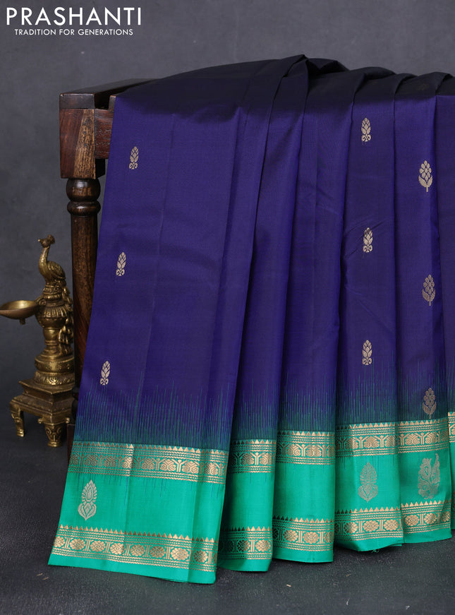 Pure kanchipuram silk saree blue and teal green with floral zari woven buttas and rettapet zari woven butta border