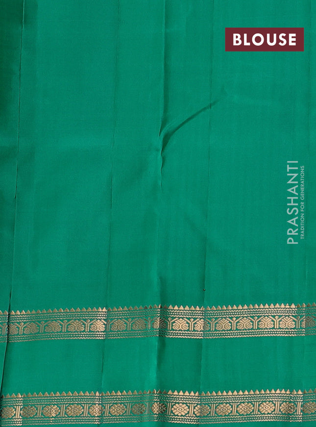 Pure kanchipuram silk saree blue and teal green with floral zari woven buttas and rettapet zari woven butta border