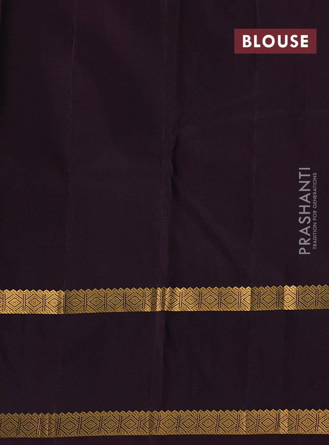 Pure kanchipuram silk saree dual shade of teal green and wine shade with allover checked pattern and rettapet zari wonen border