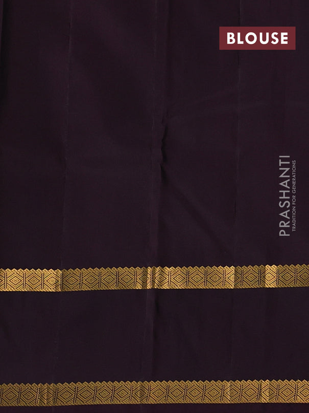 Pure kanchipuram silk saree dual shade of teal green and wine shade with allover checked pattern and rettapet zari wonen border