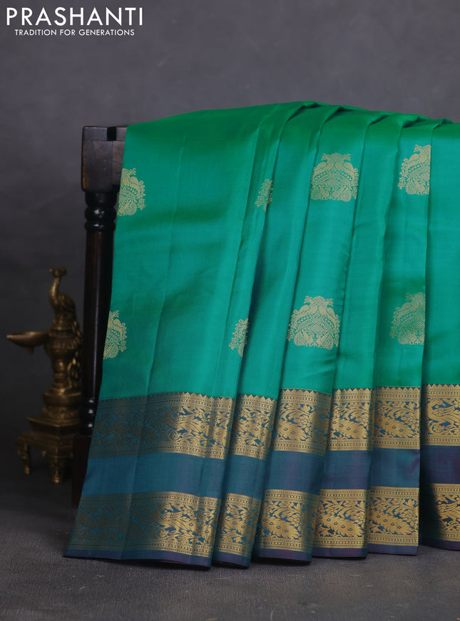 Pure kanchipuram silk saree teal green and dual shade of purple with zari woven buttas and rettapet zari woven border