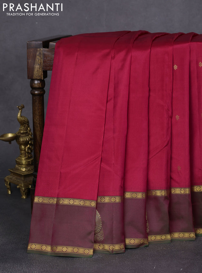 Pure kanchipuram silk saree maroon and dual shade of greenish maroon with allover zari woven buttas and rettapet zari woven paisley butta border