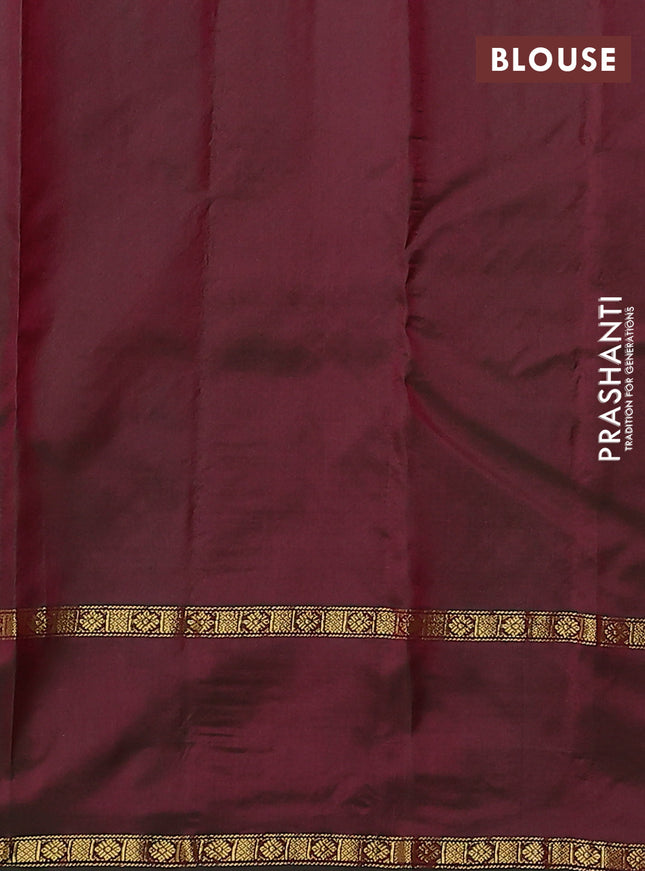 Pure kanchipuram silk saree maroon and dual shade of greenish maroon with allover zari woven buttas and rettapet zari woven paisley butta border