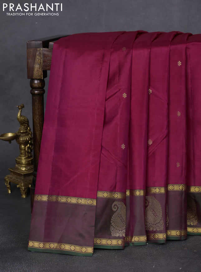 Pure kanchipuram silk saree magenta pink and dual shade of greenish maroon with zari woven buttas and rettapet zari woven paisley butta border