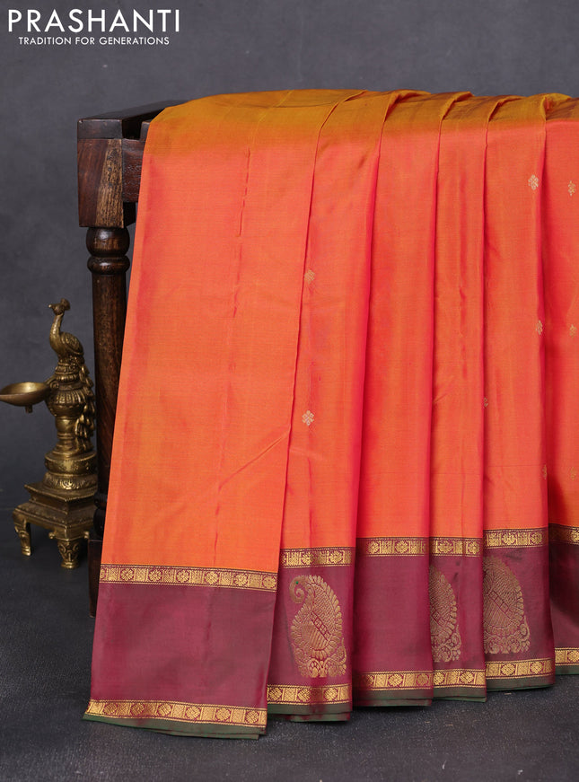 Pure kanchipuram silk saree sunset orange and dual shade of greenish maroon with zari woven buttas and rettapet zari woven paisley butta border