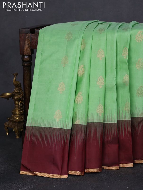 Pure kanchipuram silk saree pista green and wine shade with zari woven buttas and simple zari woven border