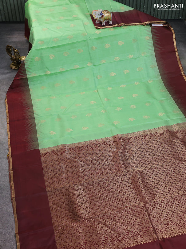 Pure kanchipuram silk saree pista green and wine shade with zari woven buttas and simple zari woven border