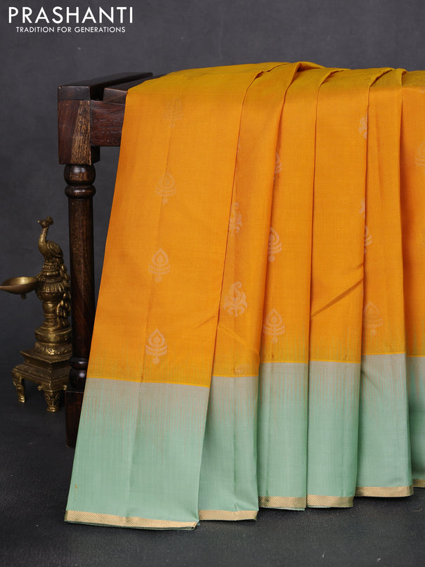Pure kanchipuram silk saree yellow and pastel green with zari woven buttas and simple zari woven border