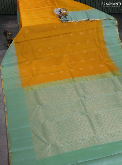 Pure kanchipuram silk saree yellow and pastel green with zari woven buttas and simple zari woven border