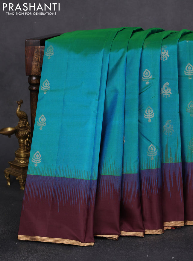Pure kanchipuram silk saree teal blue and coffee brown with zari woven buttas and simple zari woven border
