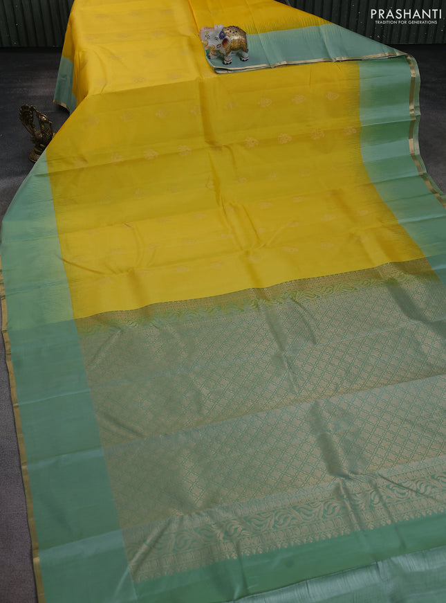 Pure kanchipuram silk saree yellow and pastel green with zari woven buttas and simple zari woven border