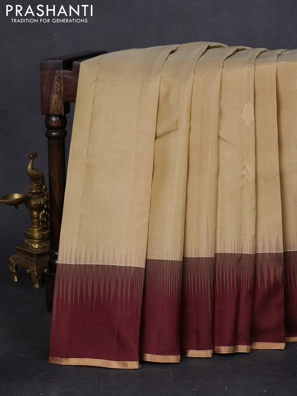 Pure kanchipuram silk saree beige and wine shade with zari woven buttas and simple zari woven border
