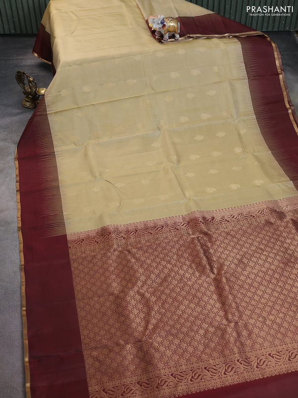 Pure kanchipuram silk saree beige and wine shade with zari woven buttas and simple zari woven border