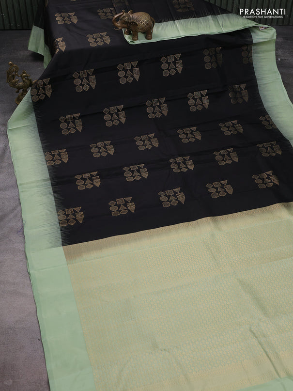 Pure kanchipuram silk saree black and pastel green with zari woven buttas and zari woven butta border