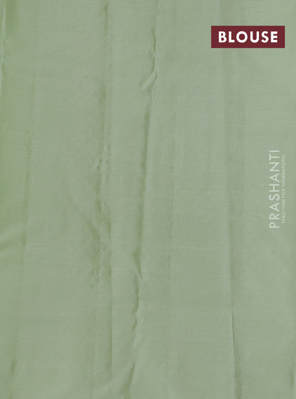 Pure kanchipuram silk saree black and pastel green with zari woven buttas and zari woven butta border