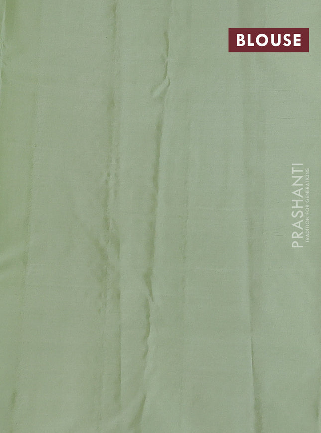 Pure kanchipuram silk saree black and pastel green with zari woven buttas and zari woven butta border