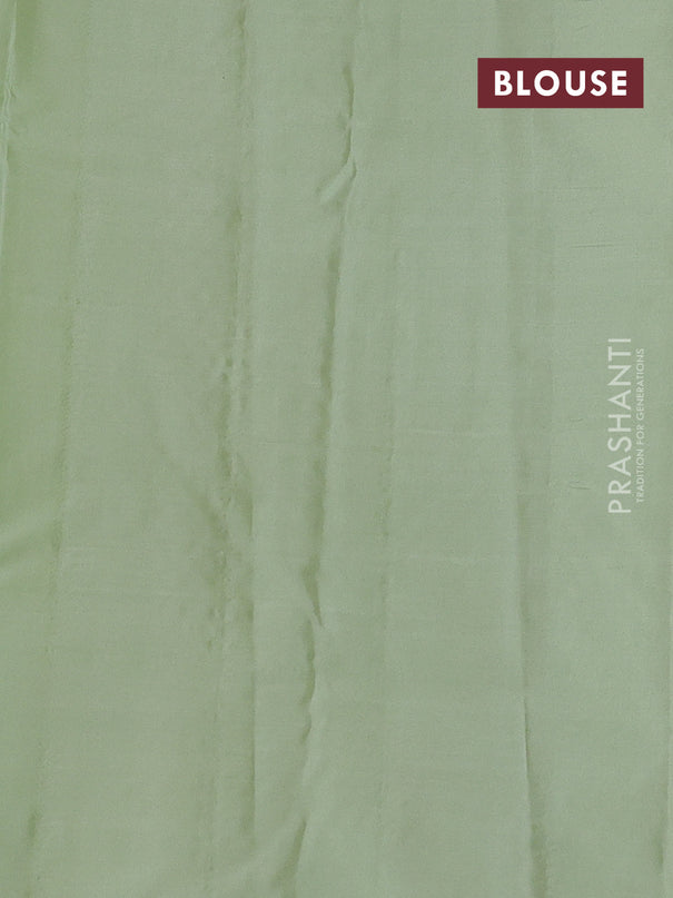 Pure kanchipuram silk saree black and pastel green with zari woven buttas and zari woven butta border