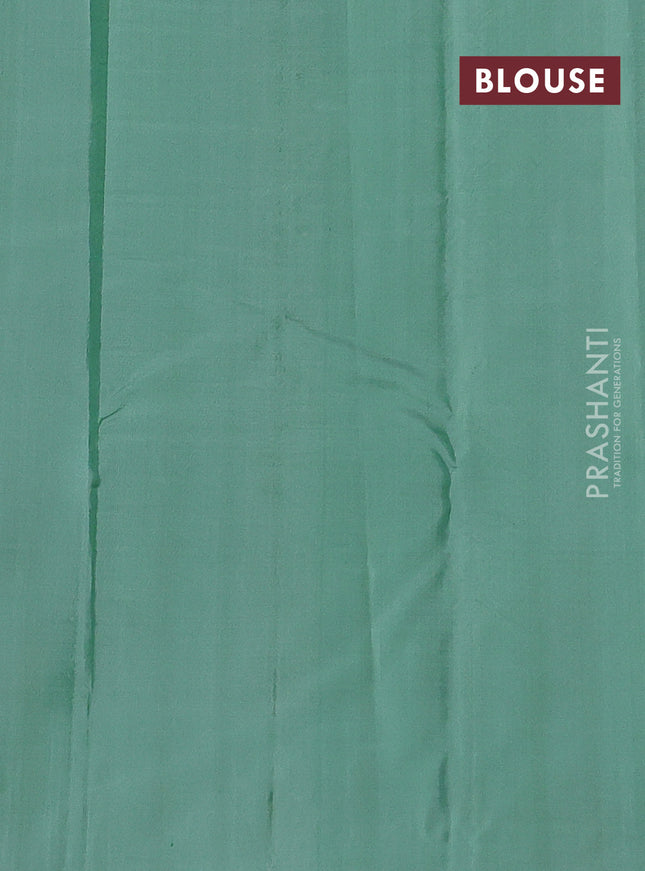 Pure kanchipuram silk saree navy blue and pastel green with zari woven buttas and zari woven butta border