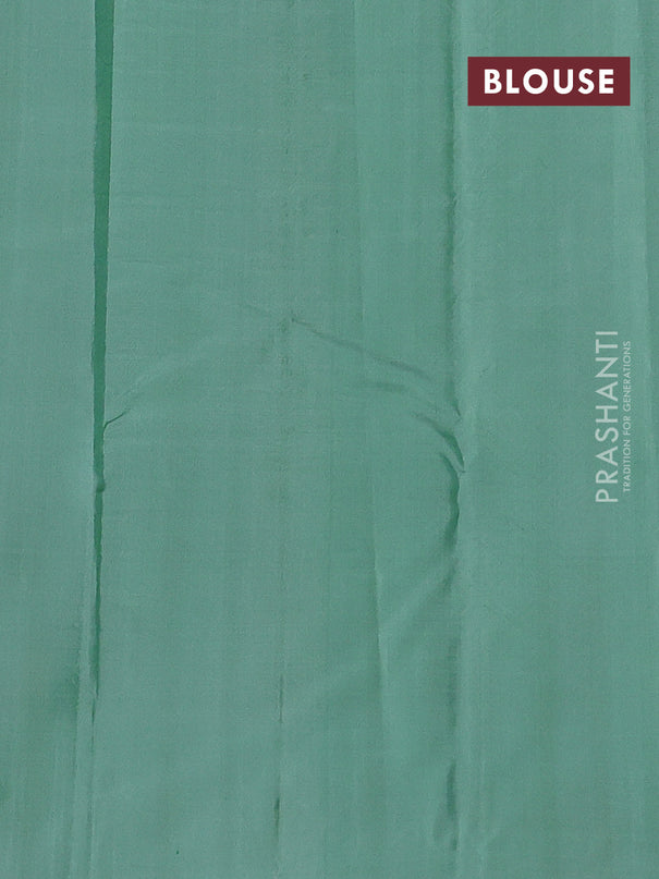 Pure kanchipuram silk saree navy blue and pastel green with zari woven buttas and zari woven butta border