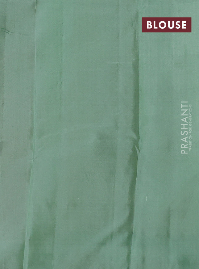 Pure kanchipuram silk saree purple and pastel green with zari woven buttas and zari woven butta border