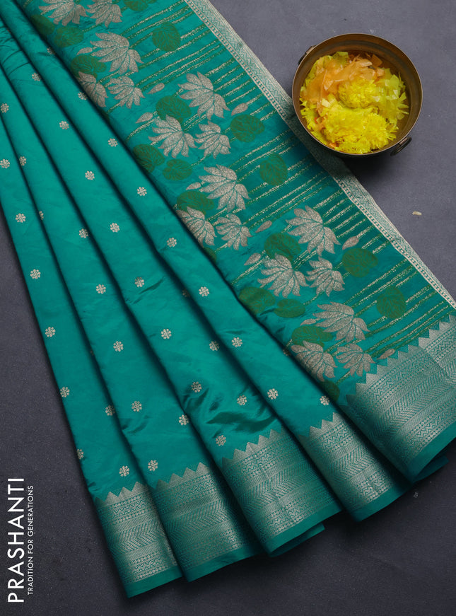 Semi raw silk saree teal green with allover zari woven buttas and zari woven border