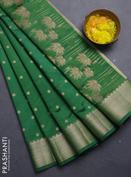 Semi raw silk saree green with allover zari woven buttas and zari woven border