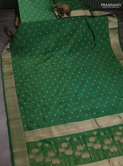 Semi raw silk saree green with allover zari woven buttas and zari woven border