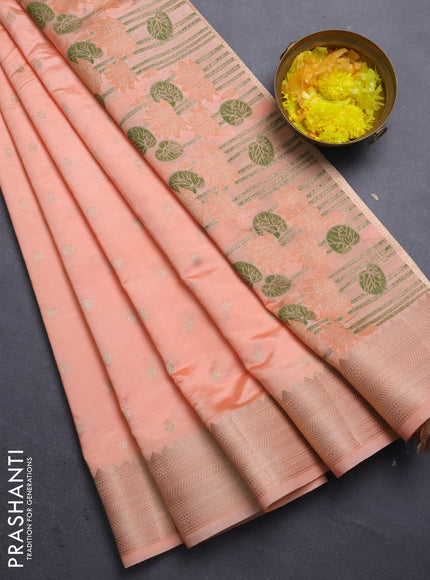 Semi raw silk saree orange with allover zari woven buttas and zari woven border