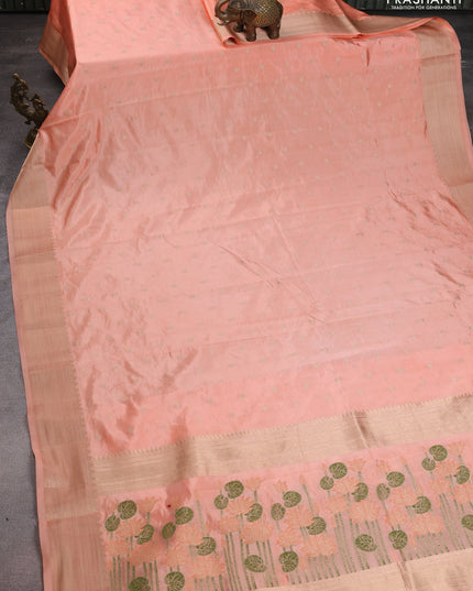Semi raw silk saree orange with allover zari woven buttas and zari woven border