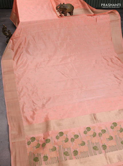 Semi raw silk saree orange with allover zari woven buttas and zari woven border