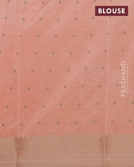 Semi raw silk saree orange with allover zari woven buttas and zari woven border