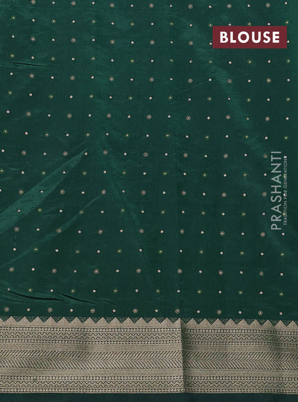 Semi raw silk saree green with allover zari woven buttas and zari woven border