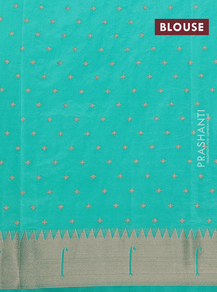 Semi raw silk saree teal green with allover zari woven buttas and pichwai design pallu