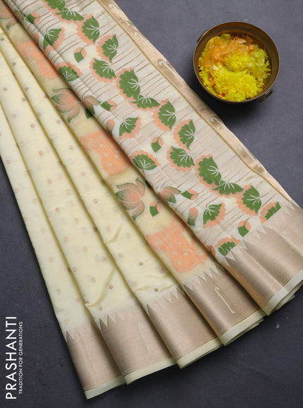 Semi raw silk saree cream with allover zari woven buttas and pichwai design pallu