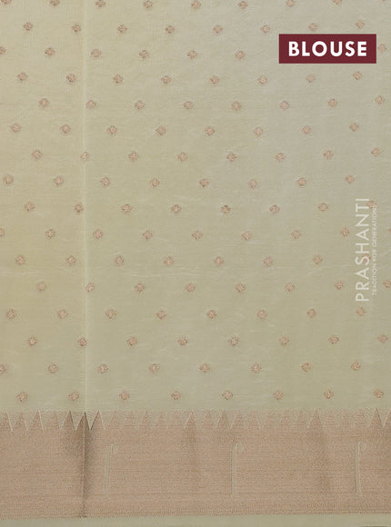 Semi raw silk saree cream with allover zari woven buttas and pichwai design pallu