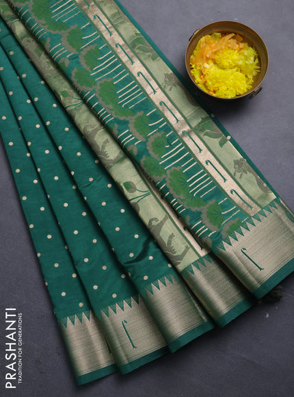 Semi raw silk saree green with allover zari woven buttas and pichwai design pallu