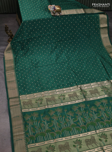 Semi raw silk saree green with allover zari woven buttas and pichwai design pallu