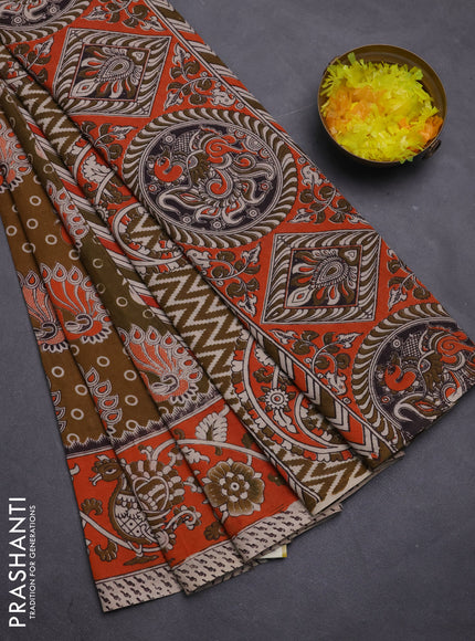 Kalamkari cotton saree dark mustard and orange with allover prints and printed border