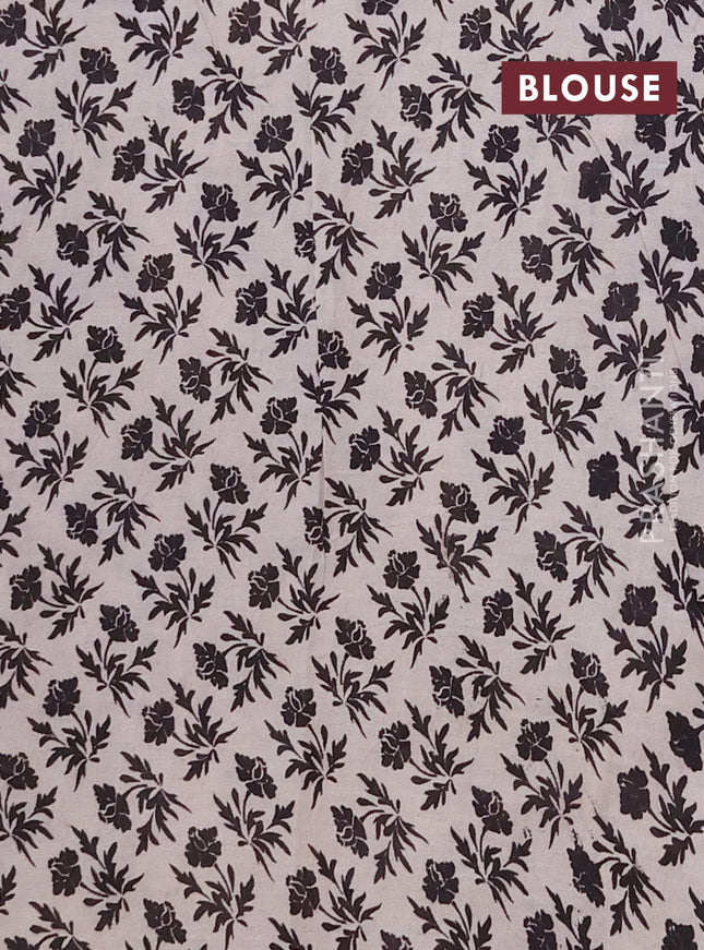 Kalamkari cotton saree black and orange with allover prints and printed border