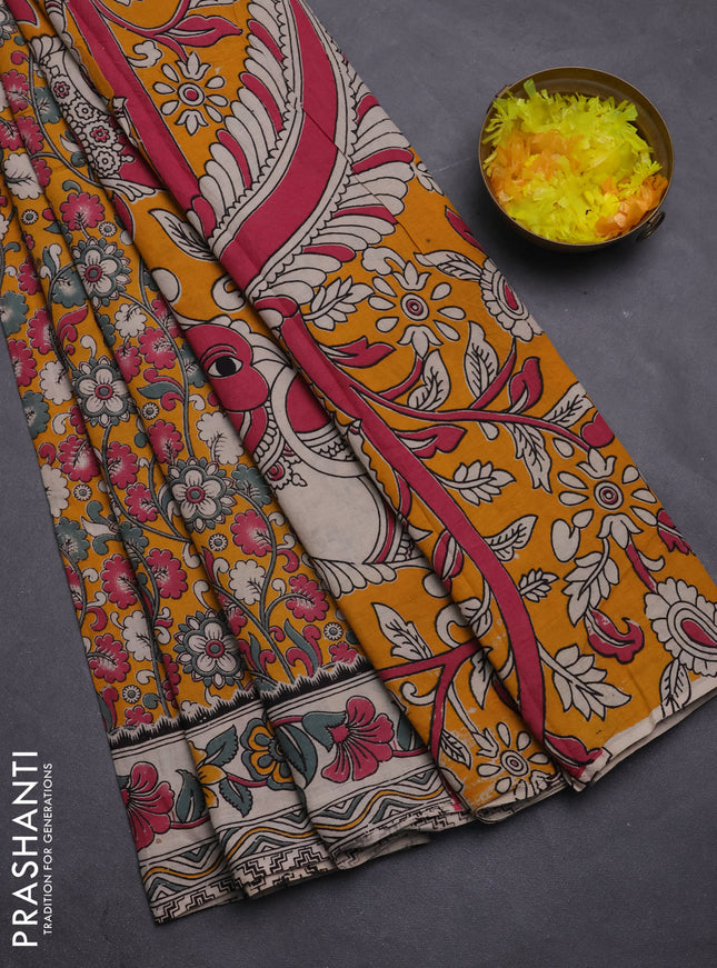 Kalamkari cotton saree yellow and beige with allover prints and printed border