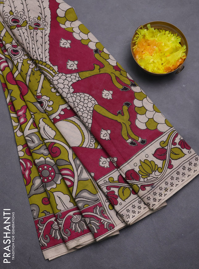 Kalamkari cotton saree light green and magenta pink with allover prints and printed border