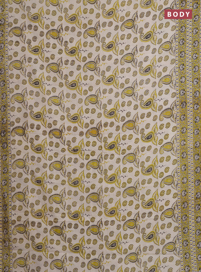 Kalamkari cotton saree beige and light green with allover prints and printed border