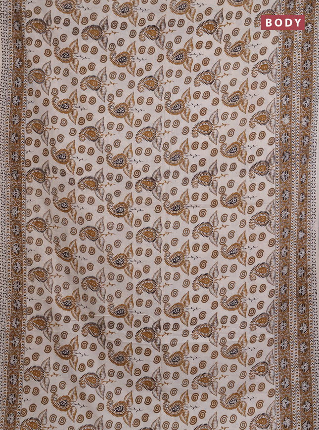 Kalamkari cotton saree beige and dark mustard with allover prints and printed border
