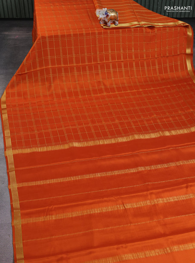 Pure mysore silk saree rustic orange with allover zari woven checked pattern and zari woven border