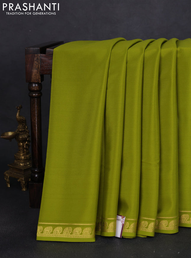 Pure mysore silk saree light green with plain body and elephant zari woven border