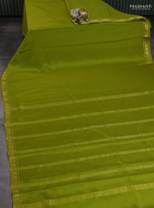 Pure mysore silk saree light green with plain body and elephant zari woven border