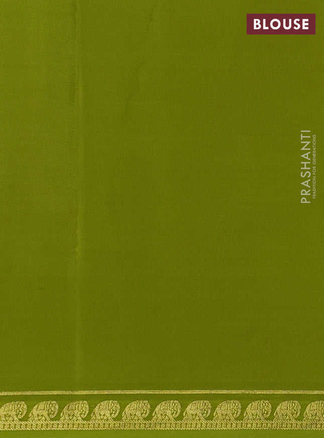 Pure mysore silk saree light green with plain body and elephant zari woven border
