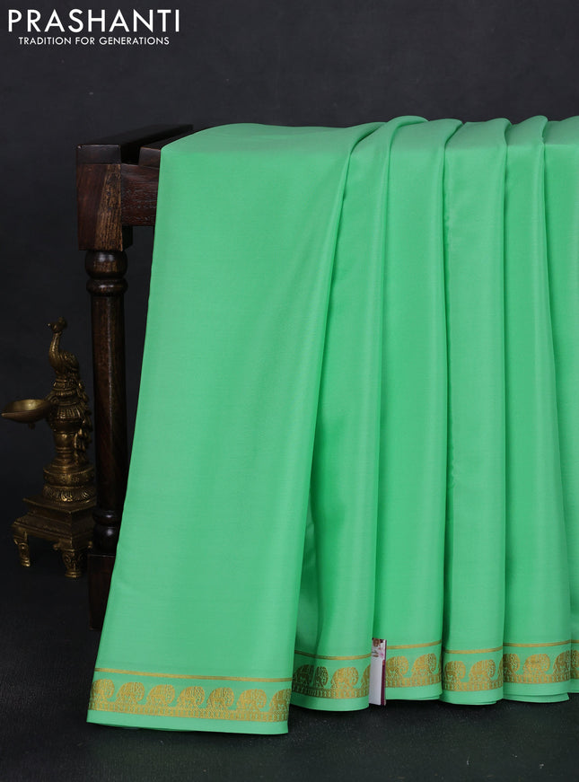 Pure mysore silk saree teal green with plain body and elephant zari woven border
