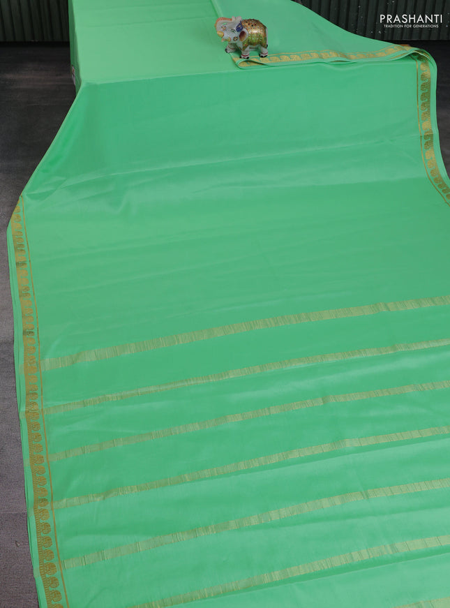 Pure mysore silk saree teal green with plain body and elephant zari woven border