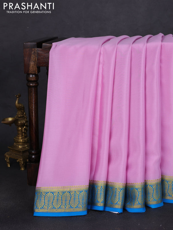 Pure mysore silk saree lotus pink and cs blue with plain body and zari woven border